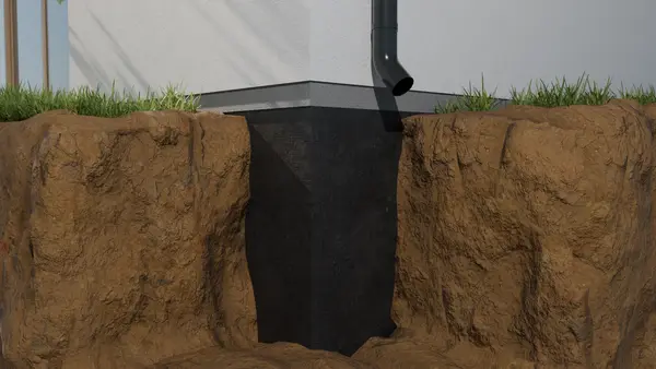 Ground Up Foundation Repair, Waterproofing and Concrete Leveling installing exterior waterproofing membranes and downspout